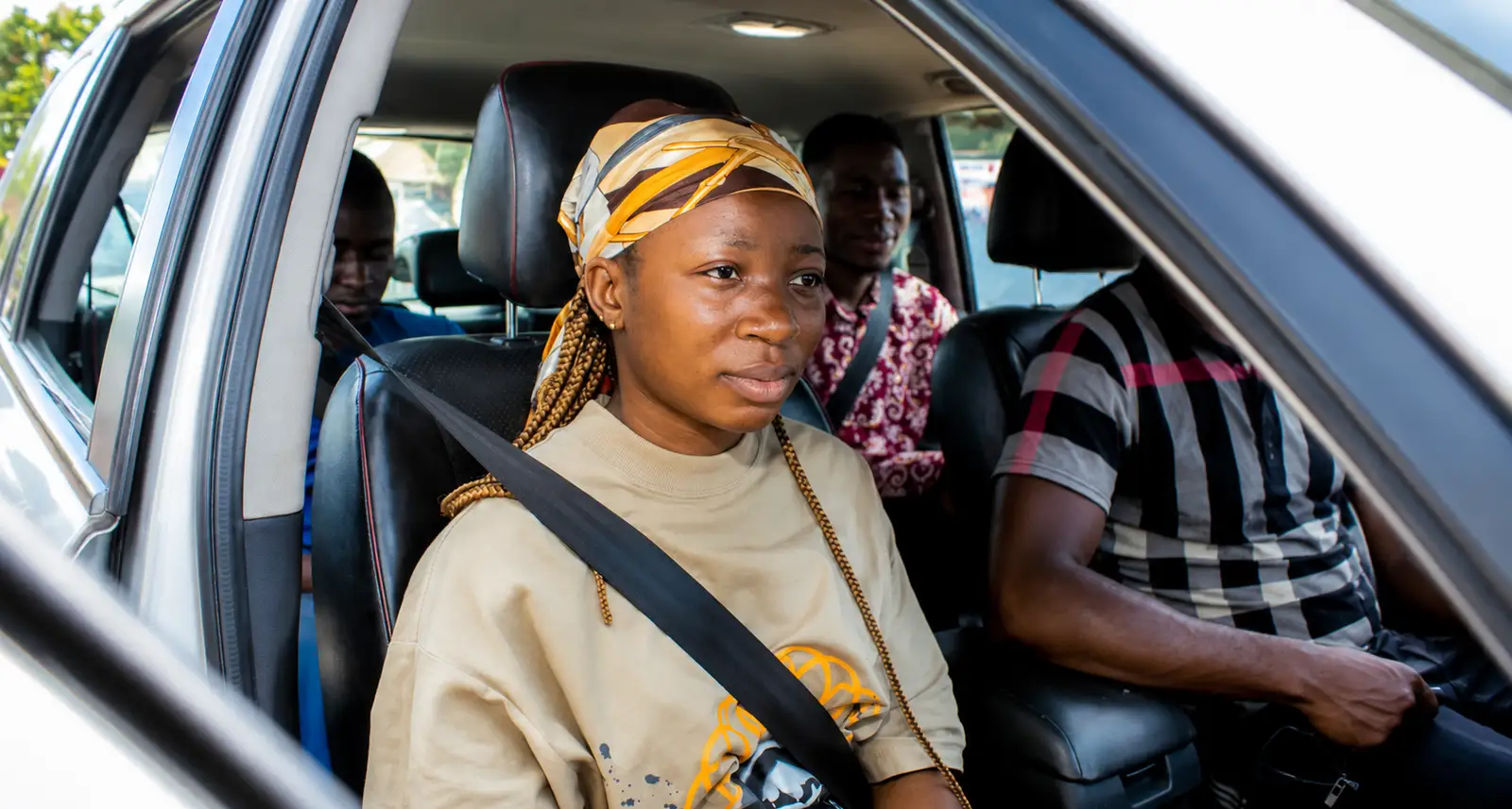 A FlexRide passenger on the move in Cameroon